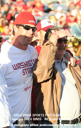 Washington State quarterback Ryan Leaf tosses practice on the sideline on  the floor of the Los Angeles Coliseum on the Cougars? first day of practice  on Sunday, Dec. 21, 1997 for their